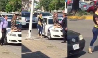 Žene na sve spremne: Popela se na auto suprugu kako bi odbranila svoj brak!(VIDEO)