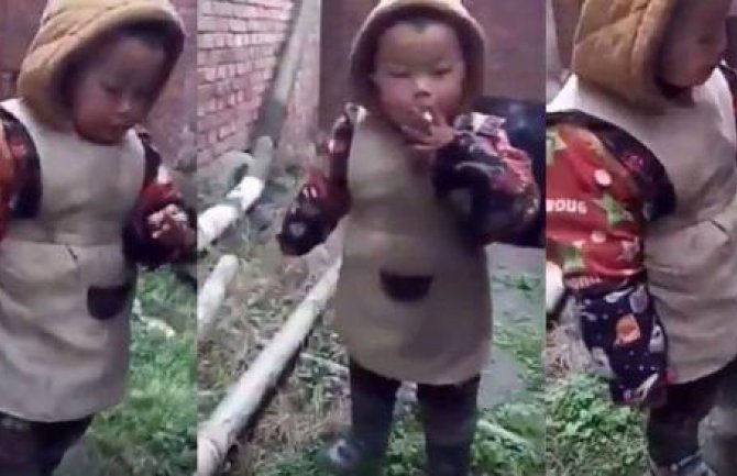 Dječak puši cigaretu i kašlje, otac ga podstiče (VIDEO)