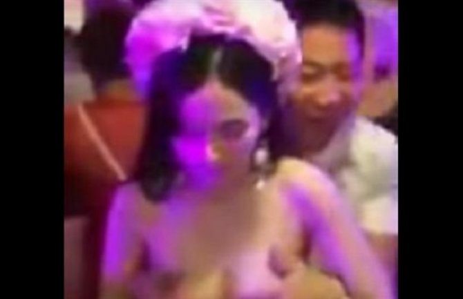 Mlada svalči gronji dio vjenčanice gosti joj prilaze i hvataju je za grudi (Video)