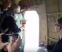 Čišćenje od alkoholizma i bluda: Ruski sveštenici svetom vodicom iz aviona osveštali grad(VIDEO)