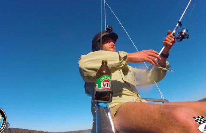 Leteći ribar visio s drona, pio pivo i pecao ribu (VIDEO)